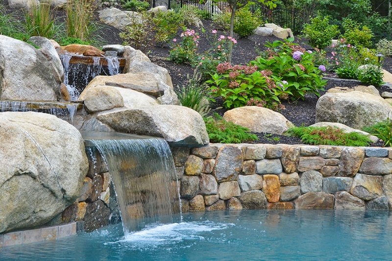 Custom stone patio installed by The Veron Company in Massachusetts